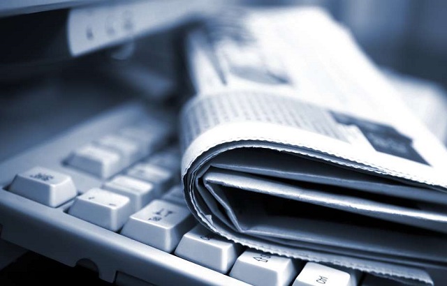 newspaper-on-keyboard-1024x590